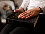 Hand on Bible