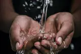 water poured through hands