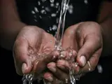 water poured through hands